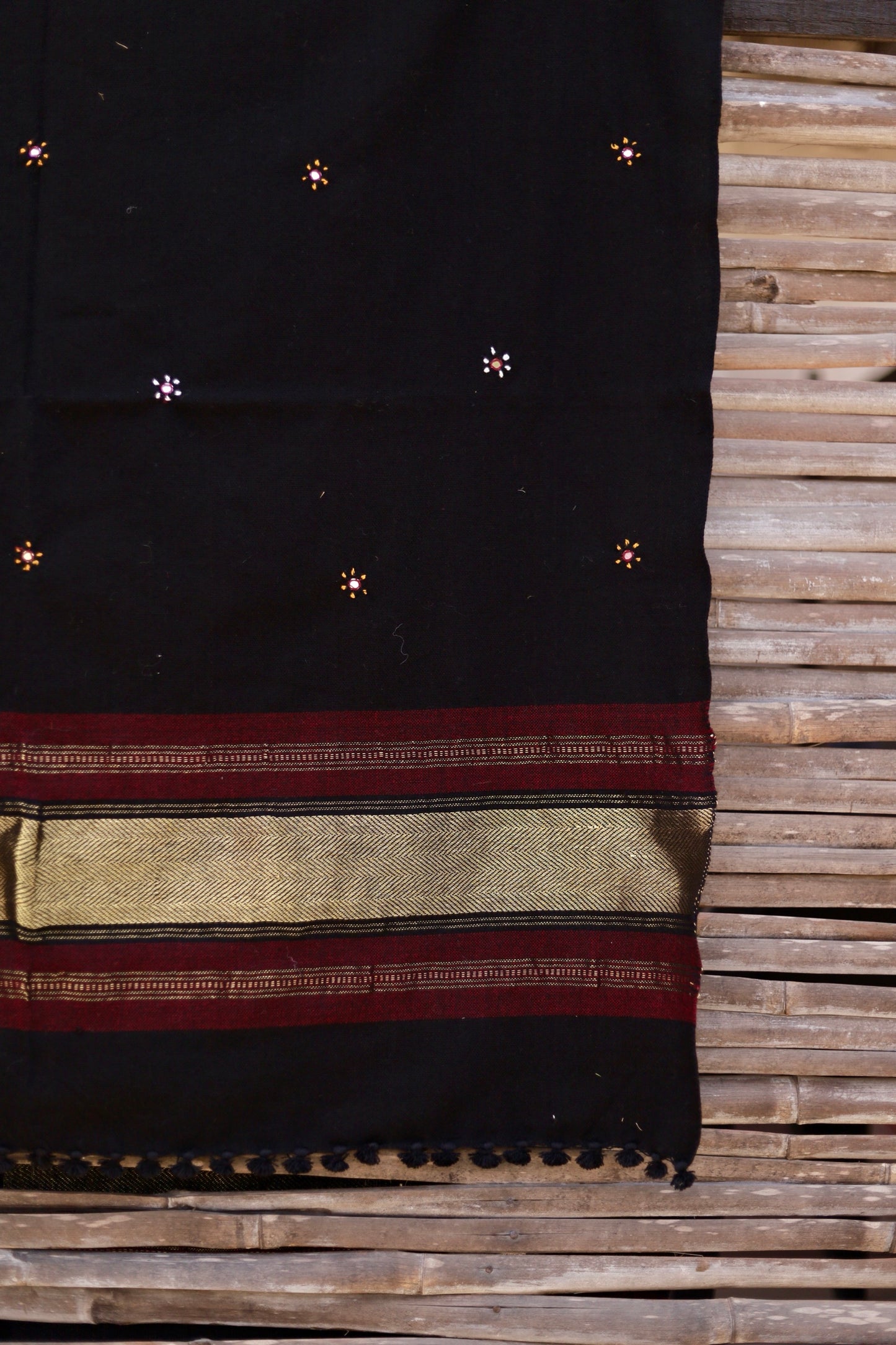 Classic handwoven woolen shawl in midnight black designed for warmth, comfort, and sophisticated styling