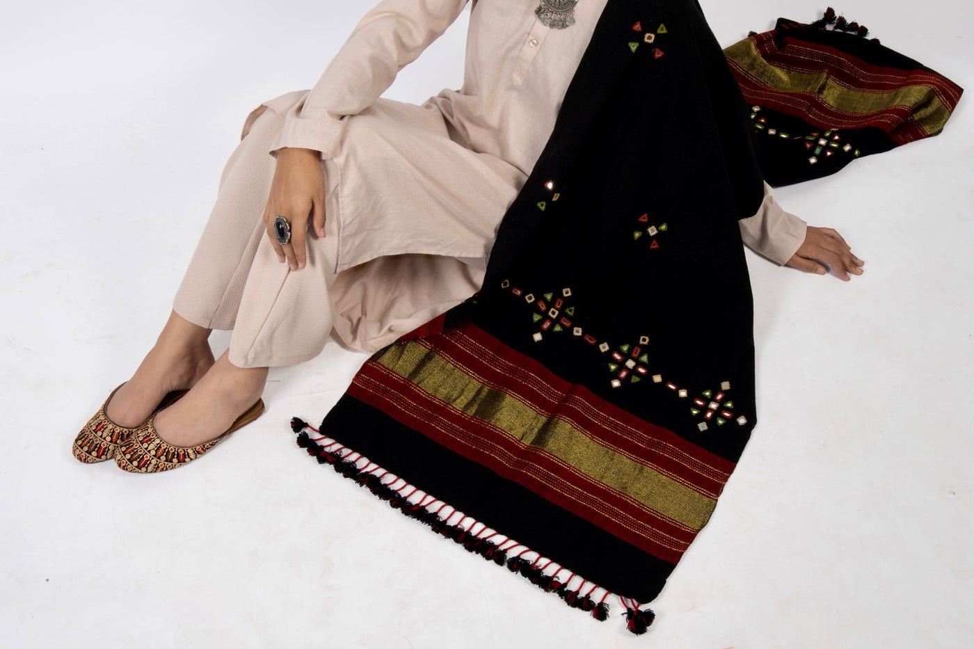 Premium handwoven woolen stole in classic black with a graceful drape and refined finish
Traditional classic black wool stole showcasing authentic handloom craftsmanship and understated elegance.
