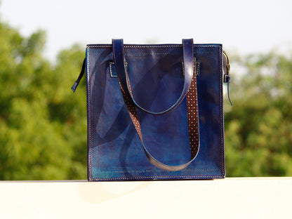 Handstitched leather bag crafted from premium leather with meticulous handmade detailing