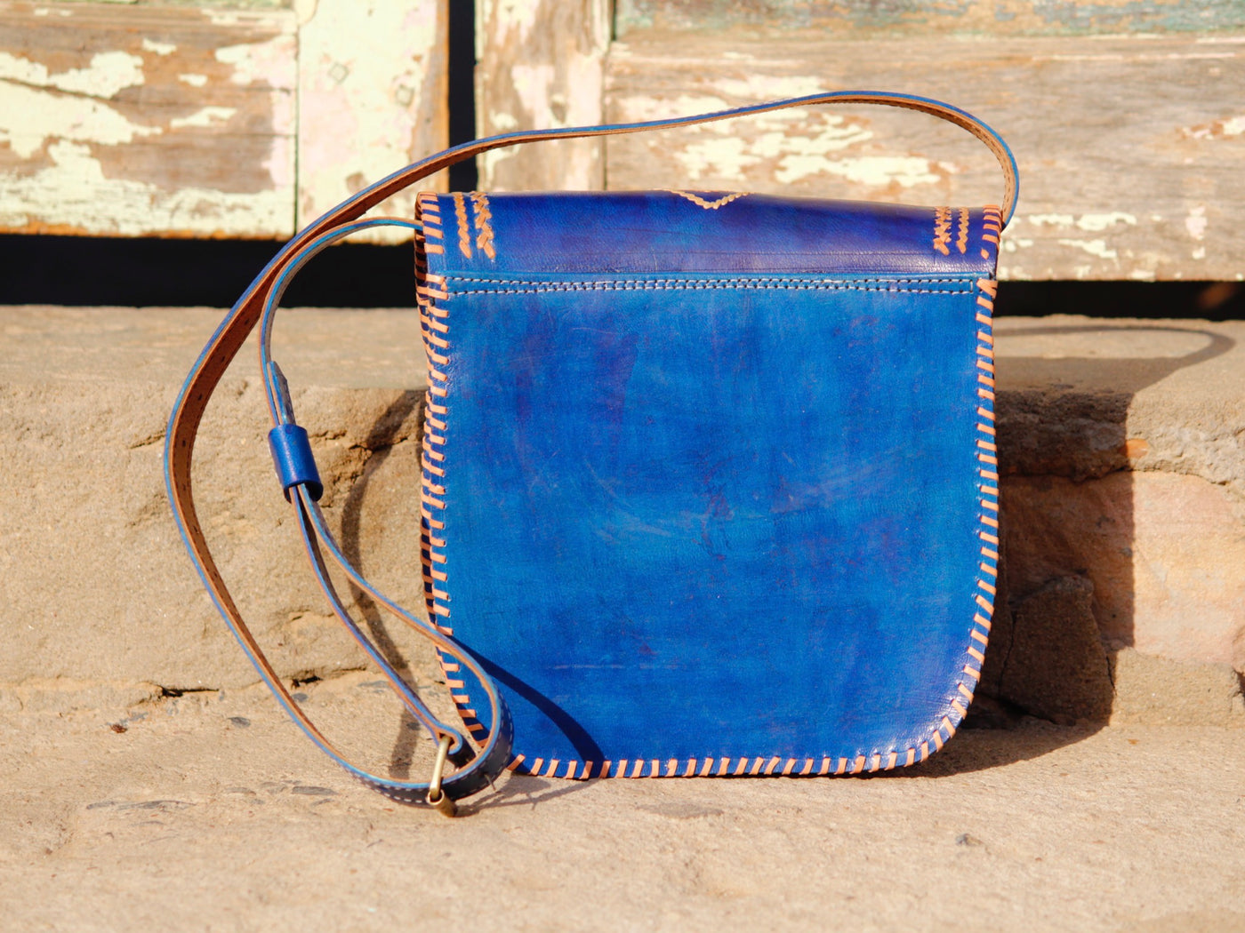 Elegant leather bag with embroidered accents and durable leather construction