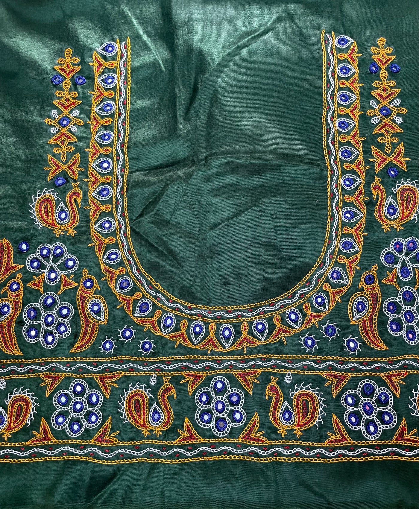 Bottle green Ahir embroidery blouse piece showcasing intricate handcrafted embroidery details