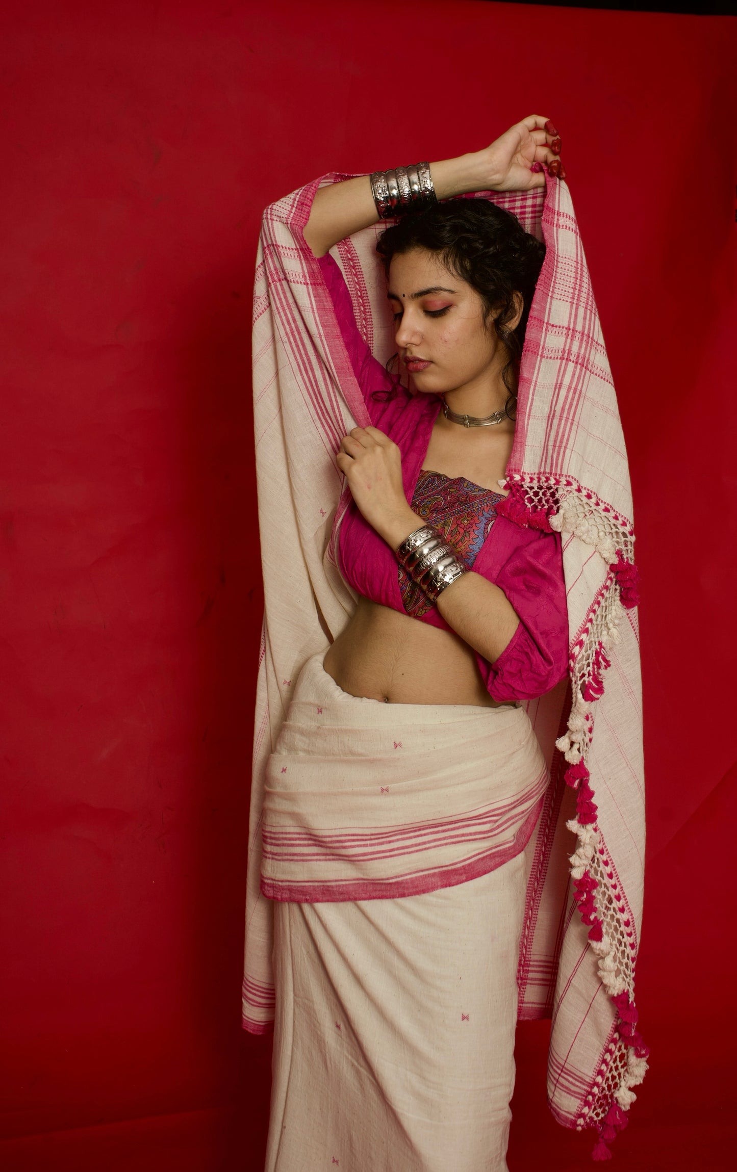 Premium petal Kala Cotton saree showcasing traditional Bhujodi textile artistry and timeless appeal. Traditional petal Bhujodi Kala Cotton saree with rich handwoven textures and graceful drape