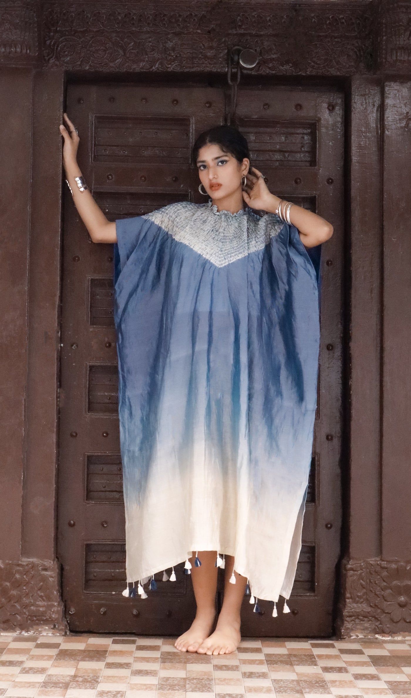 Cobalt resolve Bandhani Shibori silk kaftan showcasing intricate handcrafted resist-dye patterns and elegant drape