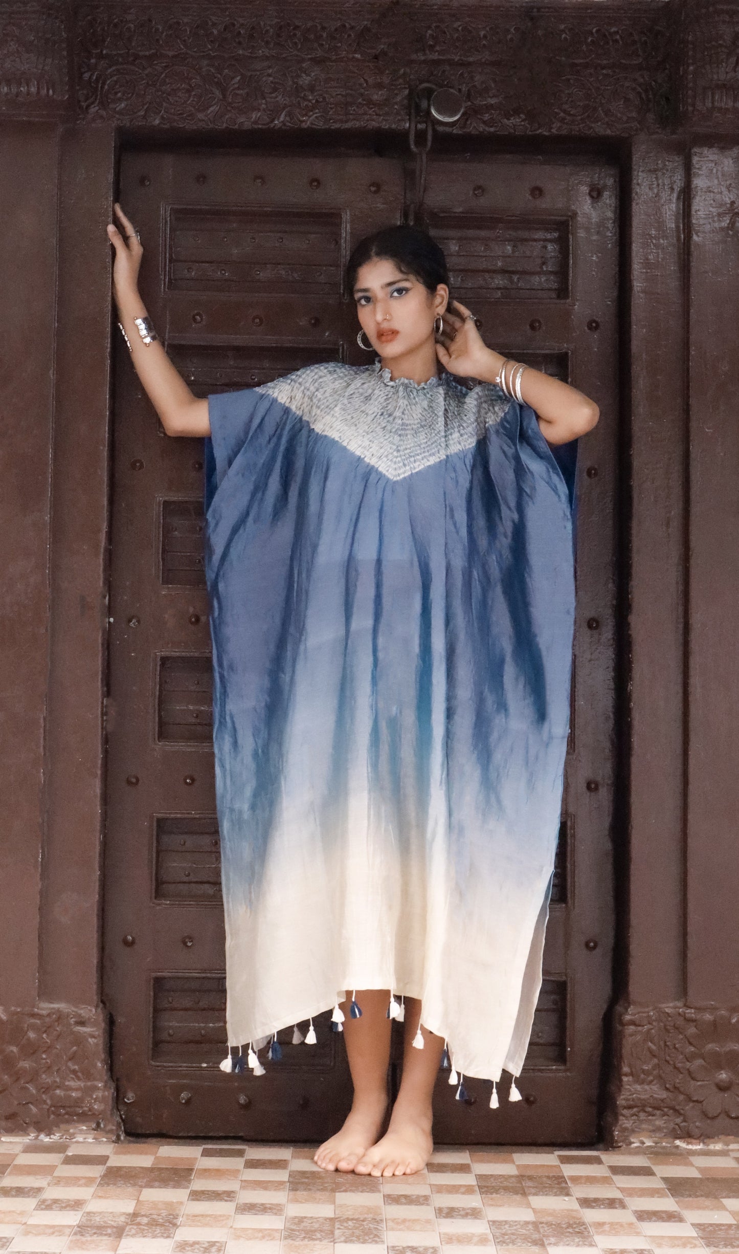 Cobalt resolve Bandhani Shibori silk kaftan showcasing intricate handcrafted resist-dye patterns and elegant drape