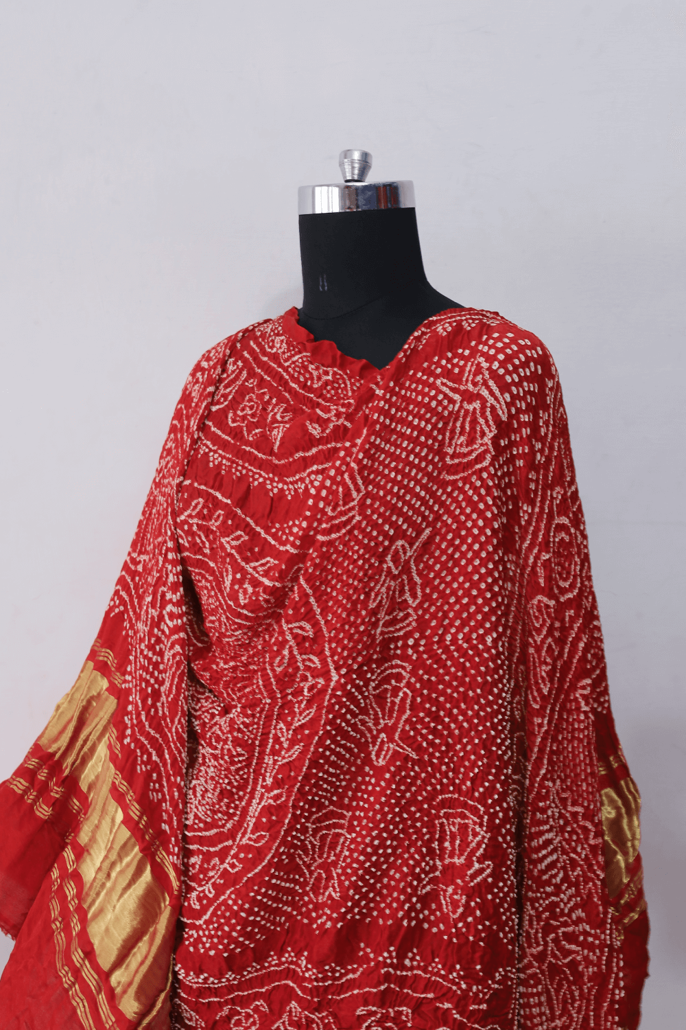 Luxurious coral red Gajji silk Rai Bandhej dupatta perfect for festive and ethnic wear