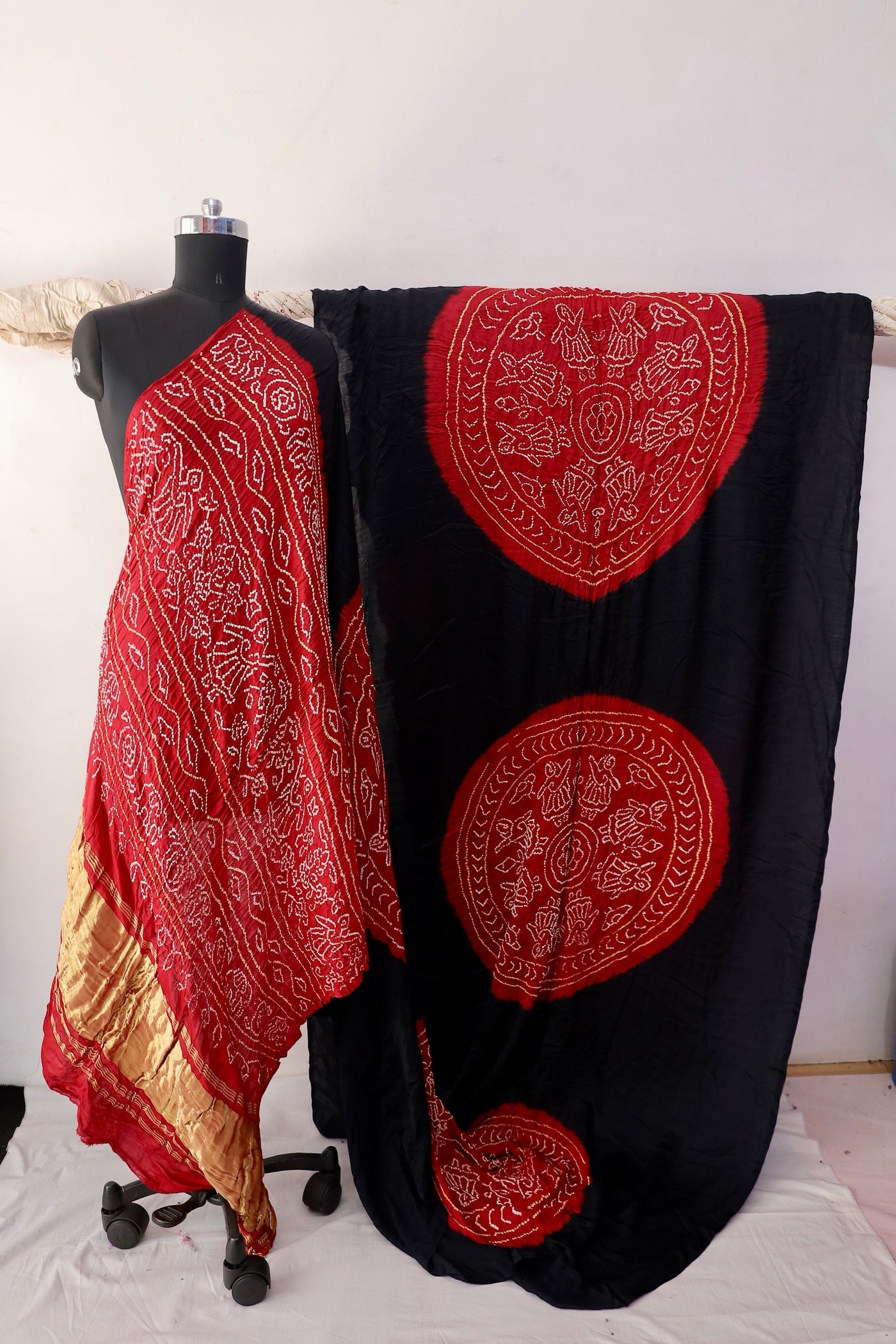 Crimson Edge Bandhani Gajji silk saree featuring intricate tie-dye patterns and an elegant zari pallu