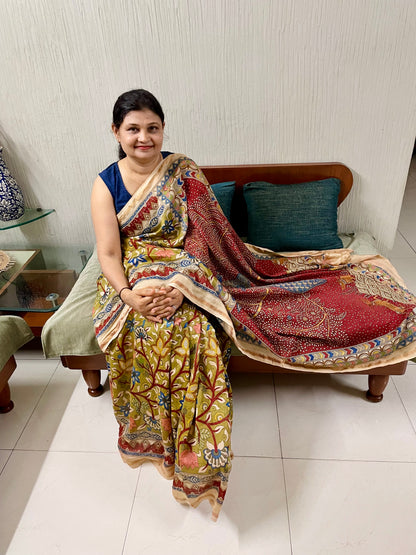 Crimson handpainted Mata Ni Pachedi saree featuring traditional sacred motifs and intricate artisan detailing