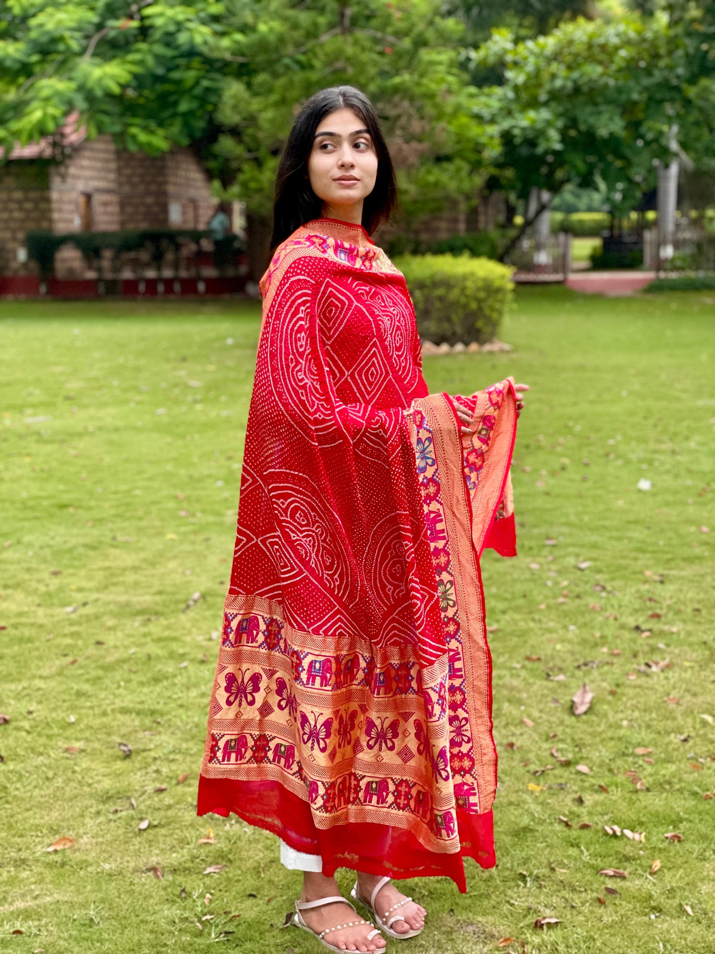 Crimson red Bandhani georgette dupatta featuring traditional tie-dye craftsmanship and flowing drape