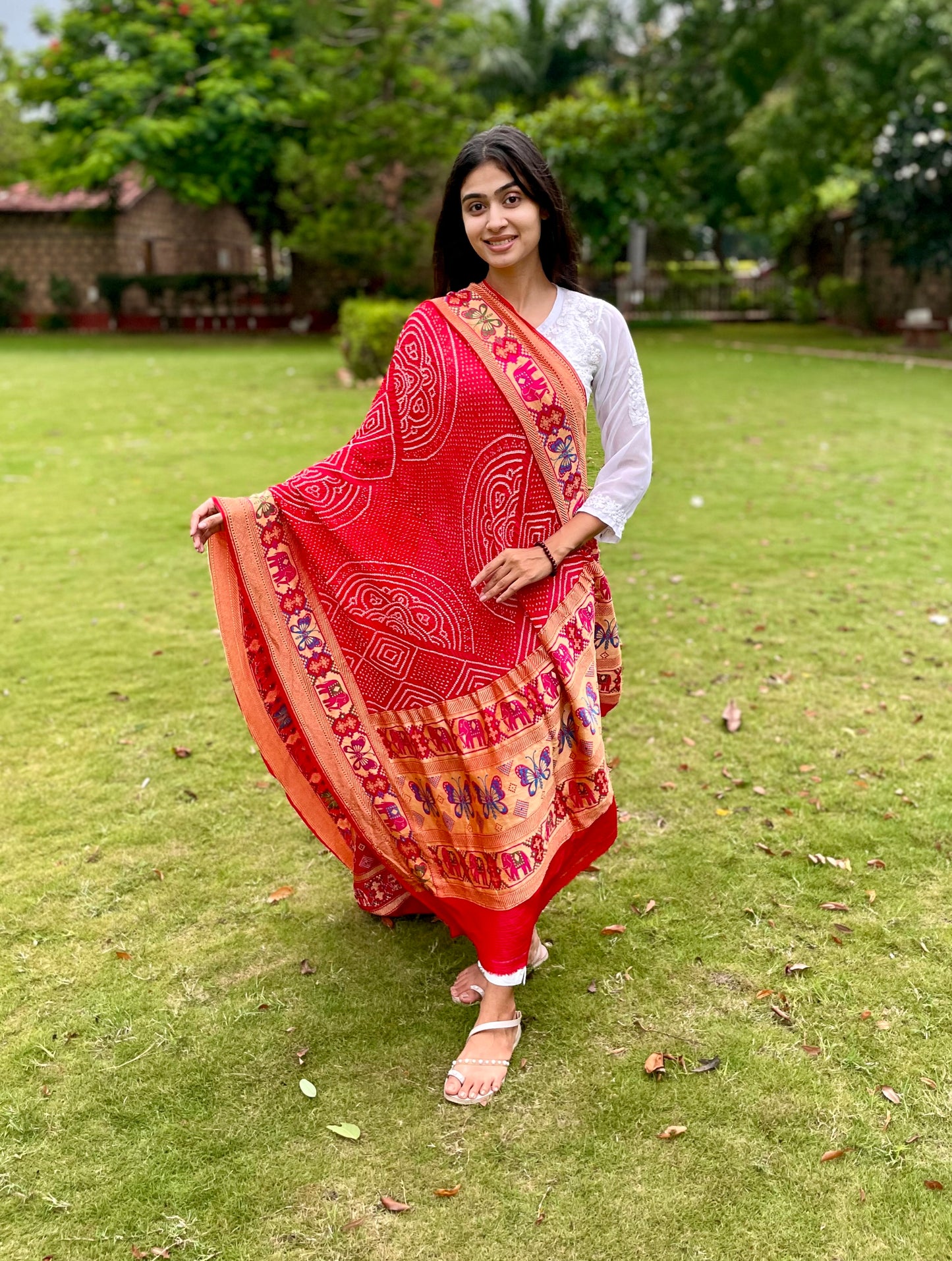 Traditional crimson red Bandhani georgette dupatta with intricate artisanal patterns