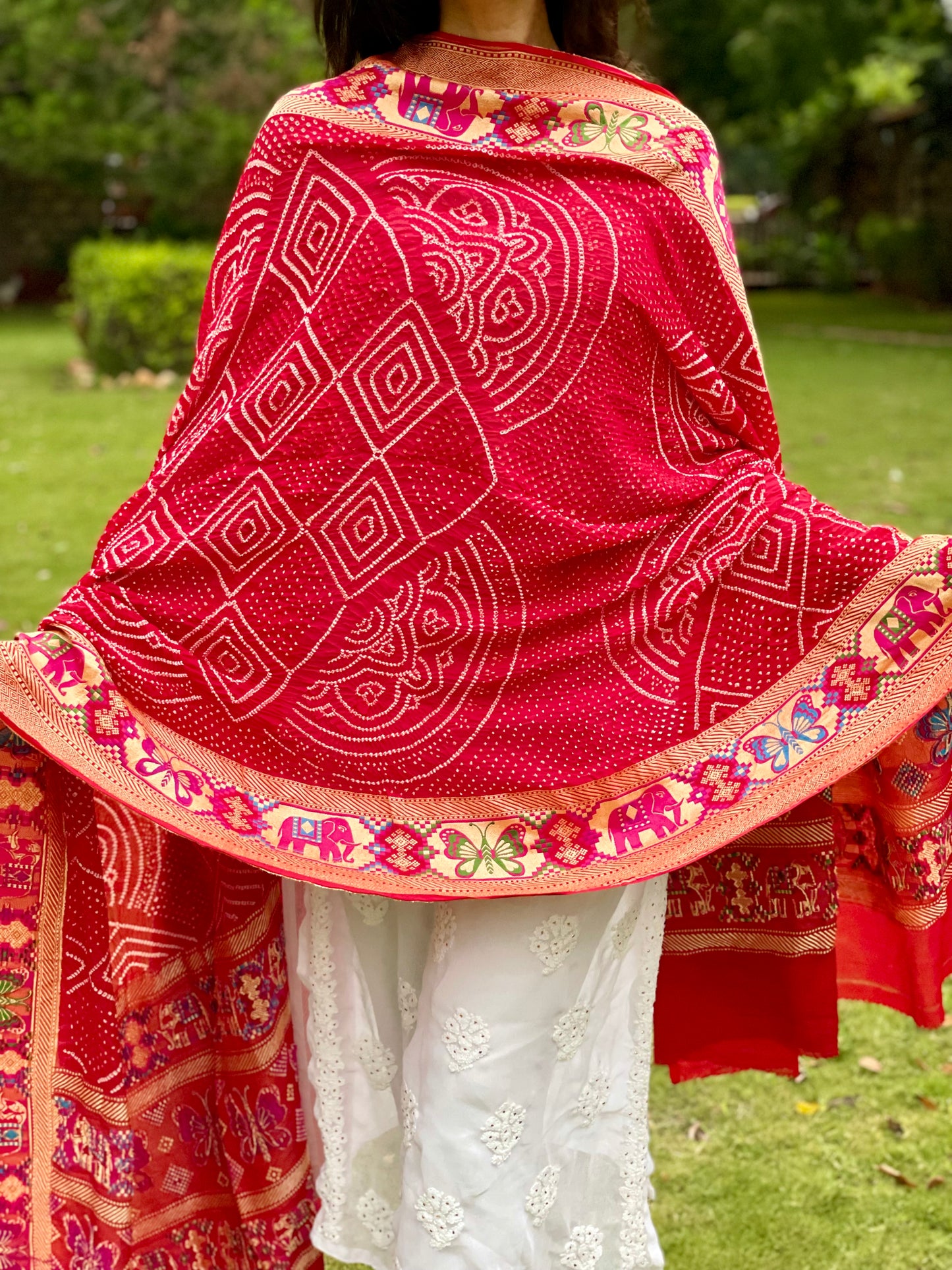Elegant crimson red Bandhani georgette dupatta with soft texture and graceful movement