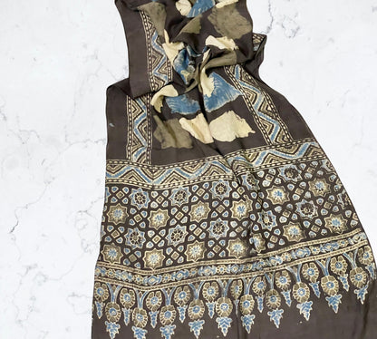 Dark olive green Ajrakh modal silk stole featuring intricate hand block printed motifs and elegant drape
