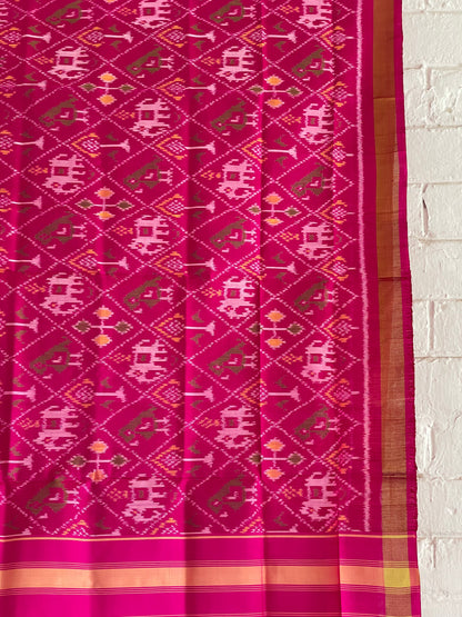 Dark pink Patola Single Ikkat dupatta featuring intricate woven motifs and traditional artisan craftsmanship