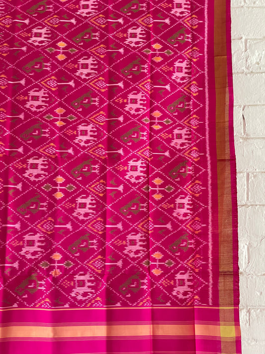 Dark pink Patola Single Ikkat dupatta featuring intricate woven motifs and traditional artisan craftsmanship