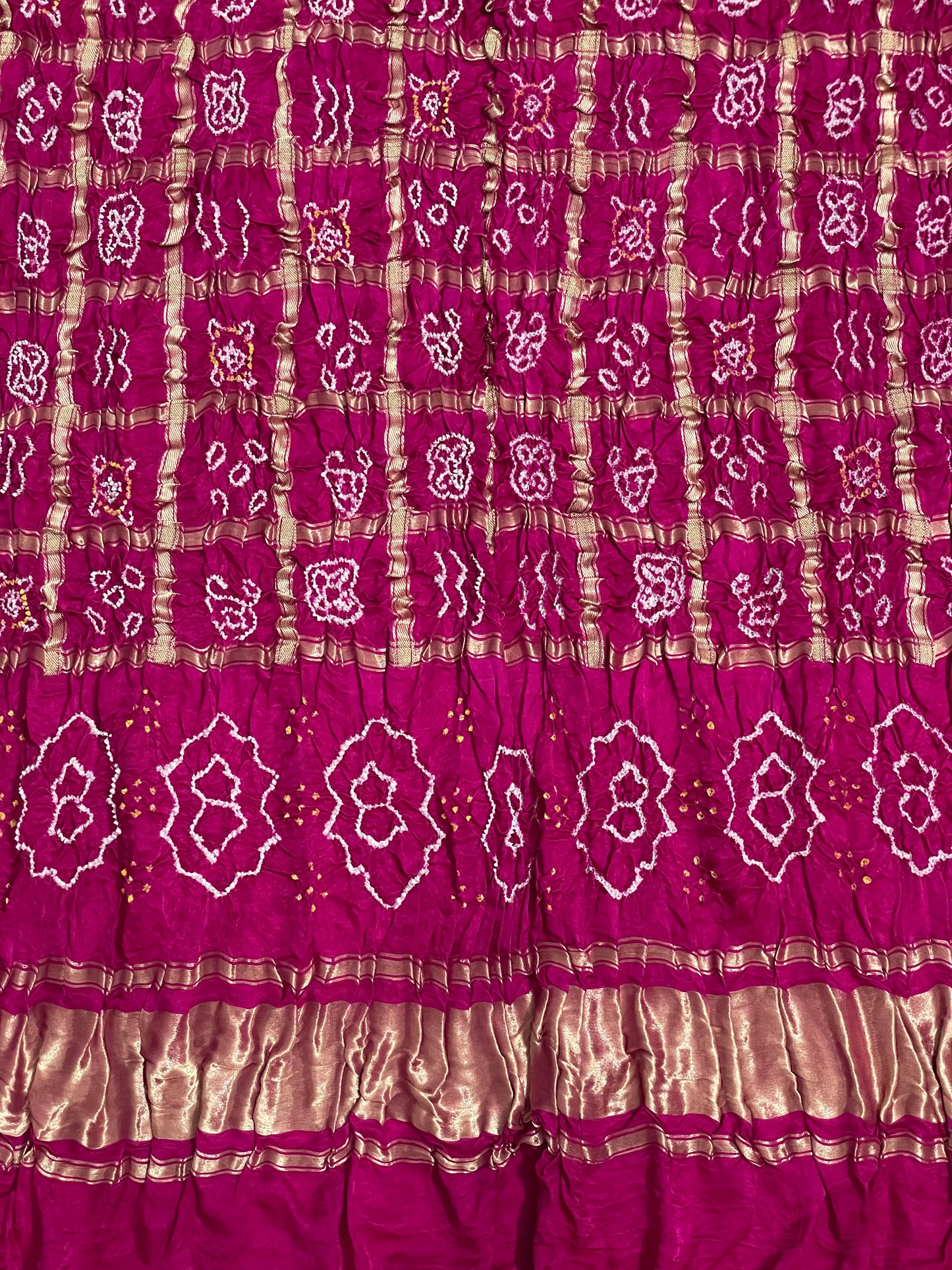 Handcrafted dark rose pink Gharchola dupatta featuring authentic Bandhani patterns and zari detailing