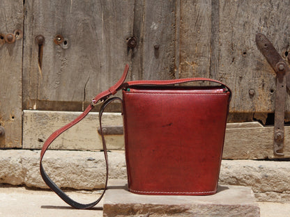 Premium leather bag combining skilled leatherwork with artistic thread detailing