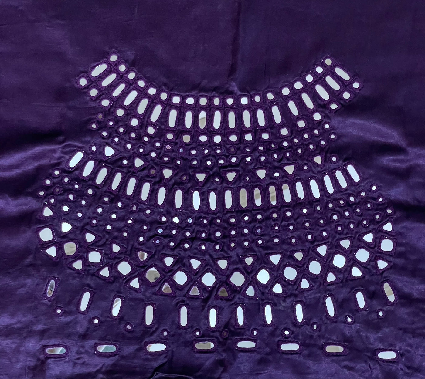 Deep violet mirror work blouse piece showcasing intricate handcrafted embellishments