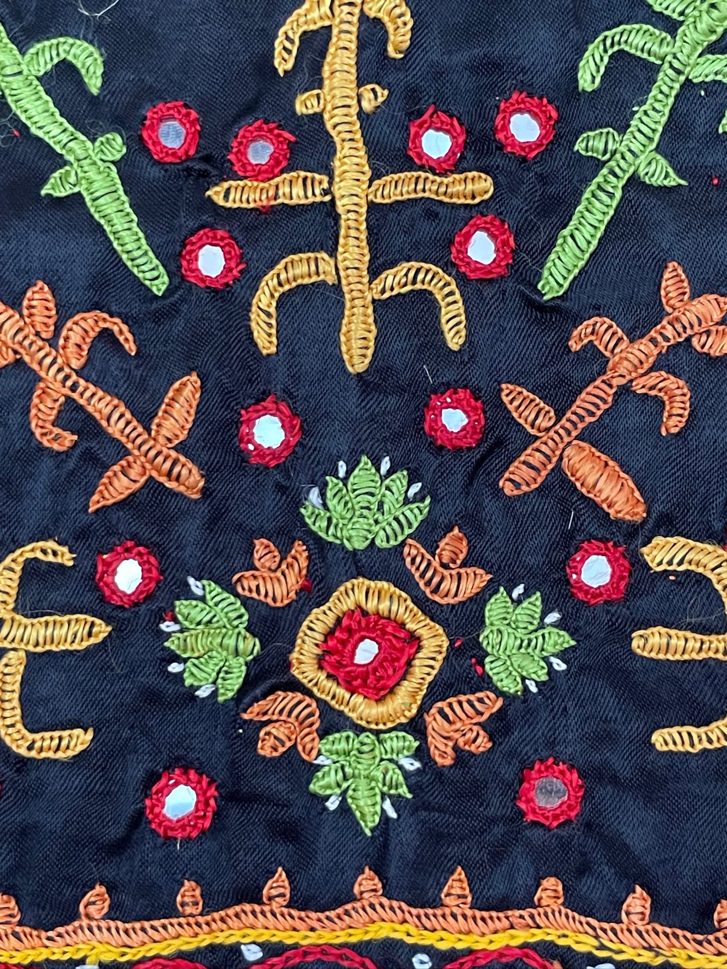Elegant deep navy blouse piece adorned with detailed Pakko embroidery motifs