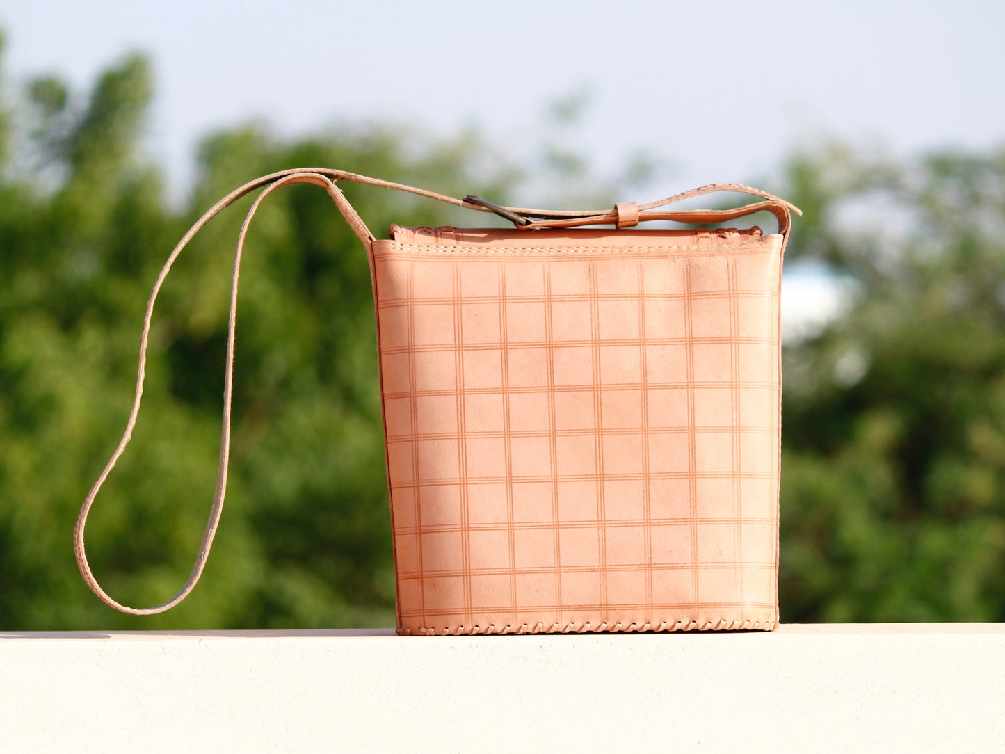 Premium leather bag with carefully handstitched accents and elegant finish