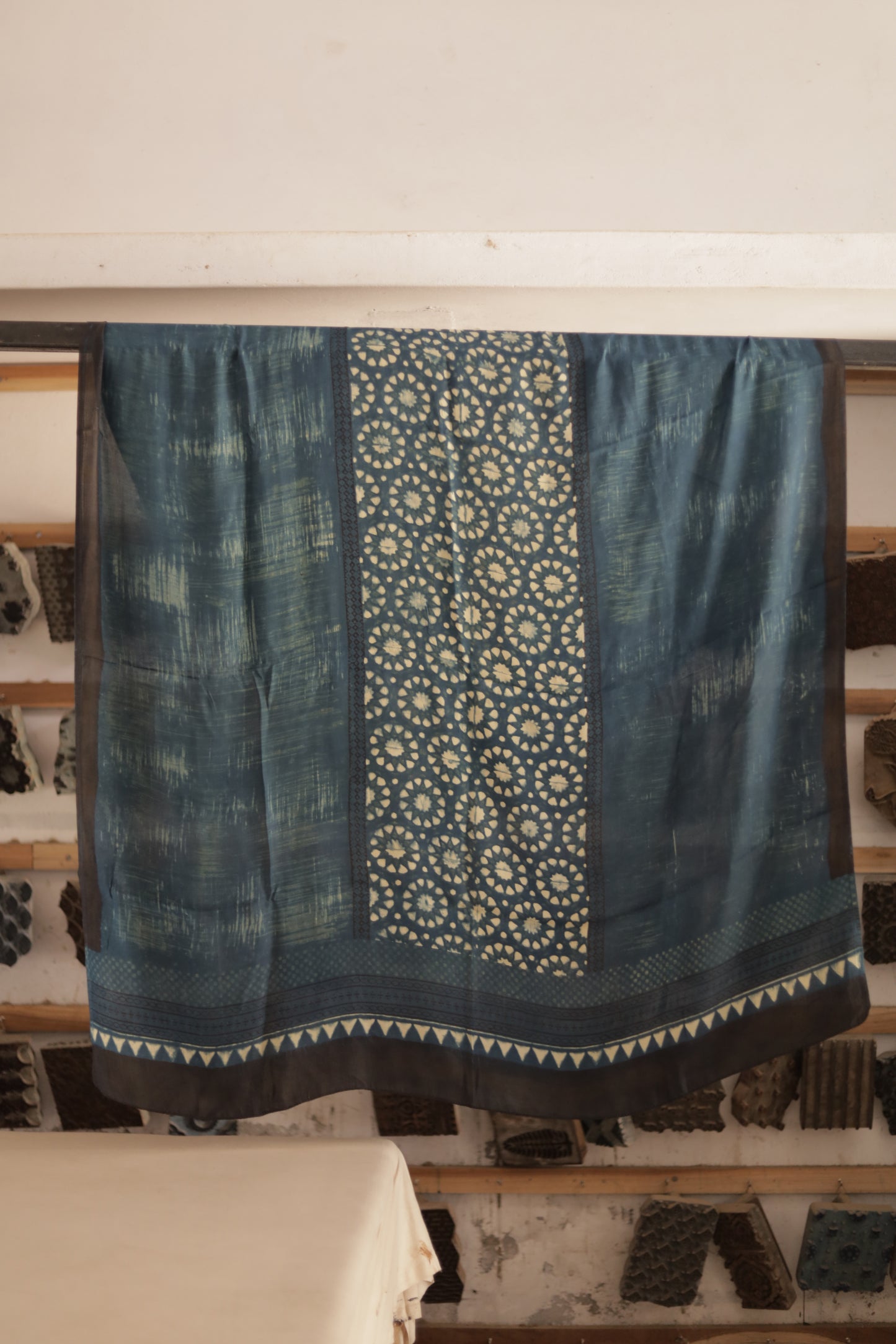 Dusty indigo Ajrakh modal silk dupatta featuring intricate hand block printed motifs and elegant drape