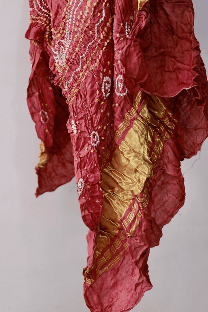 Luxurious dusty rose Bandhani dupatta crafted in soft and lustrous Gajji silk