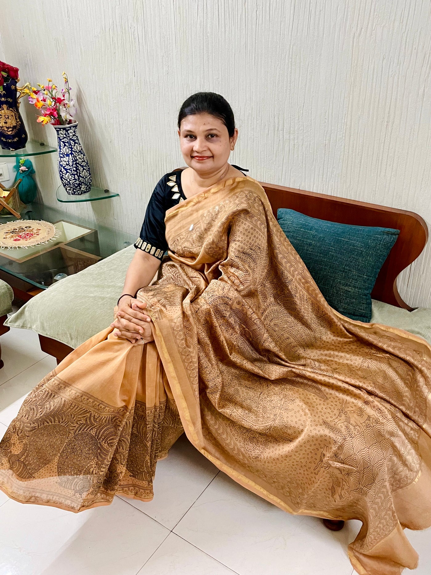 Elegant ancient gold saree showcasing detailed Mata Ni Pachedi artwork created by skilled artisans