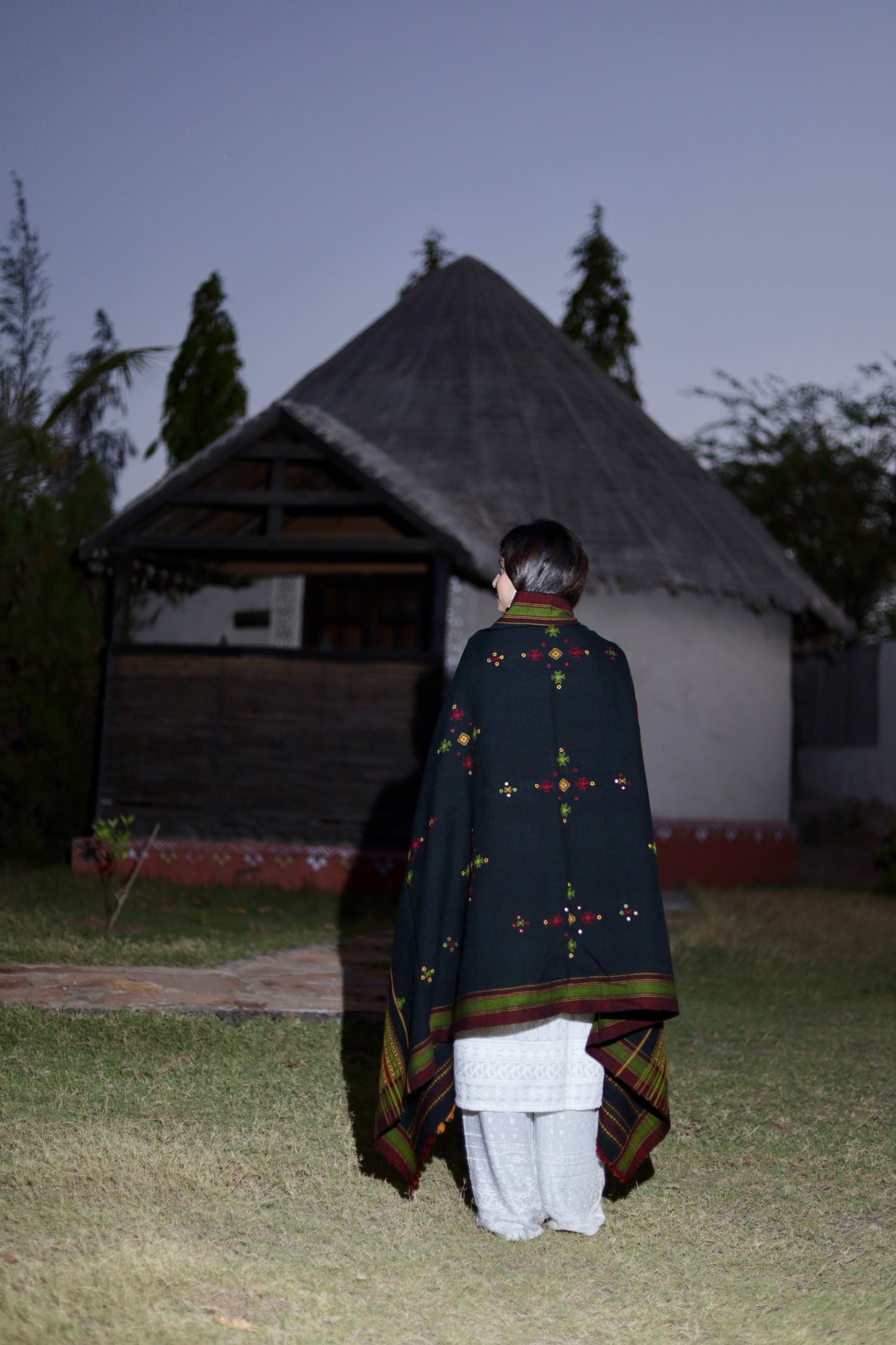 Traditional black wool shawl showcasing skilled craftsmanship and timeless design