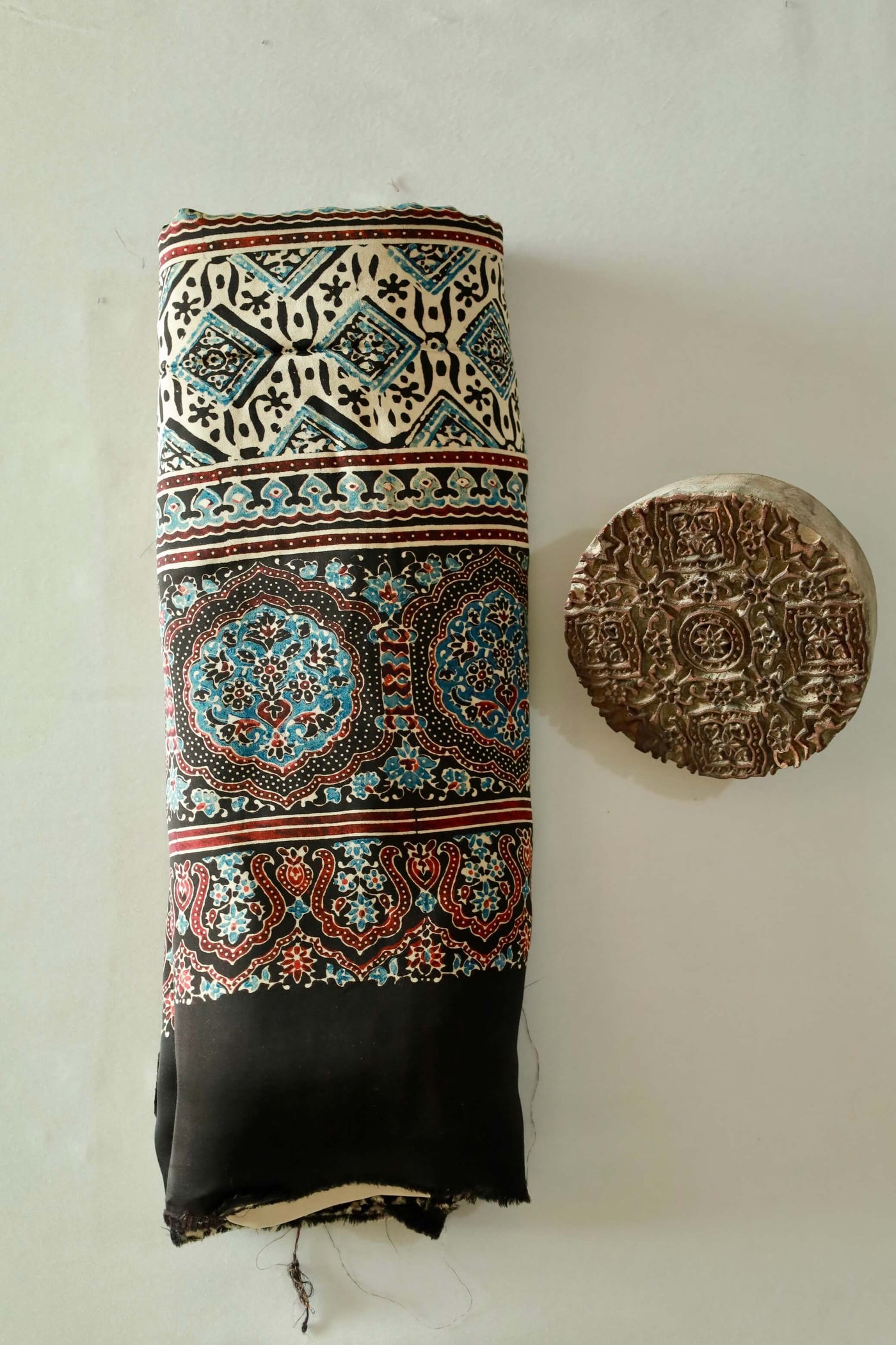 Elegant black sunflower Ajrakh saree crafted in luxurious modal silk with heritage-inspired designs