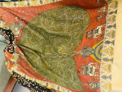 Elegant bronze saree showcasing detailed Mata Ni Pachedi artwork created by skilled artisans