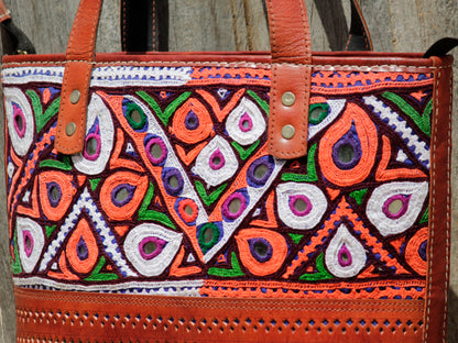 Elegant brown leather bag with colorful Kutchi hand embroidery and durable construction