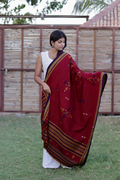 Traditional burgundy wool shawl showcasing authentic weaving artistry and timeless elegance