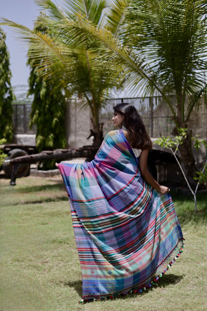 Handcrafted carnival Kala Cotton saree adorned with authentic Bhujodi weaving and heritage-inspired motifs