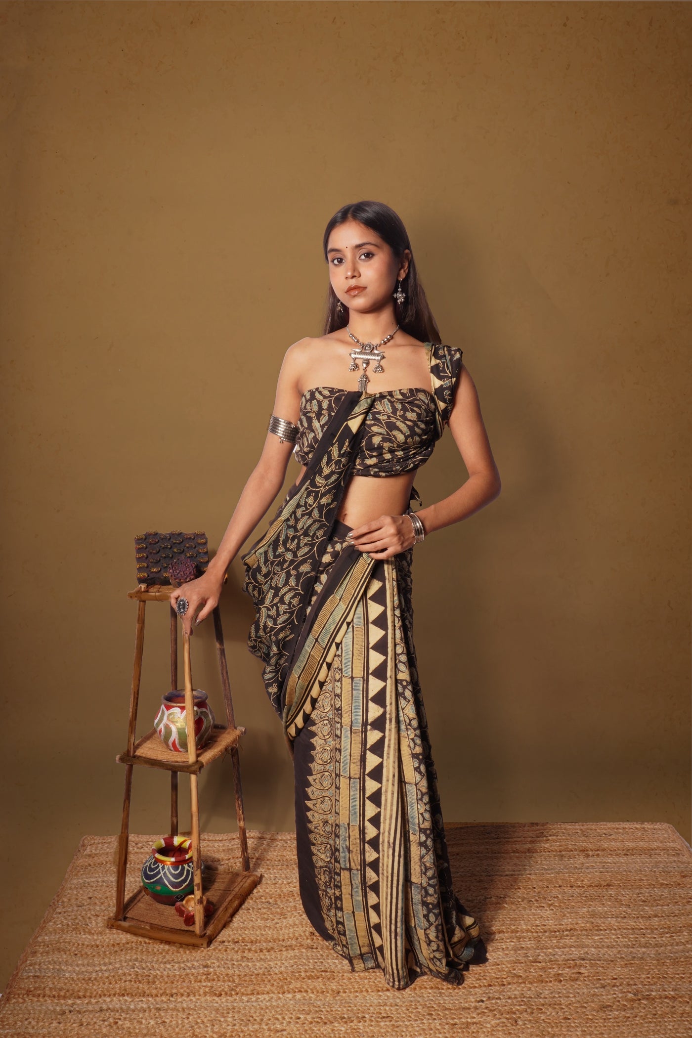 Elegant chocolate brown Ajrakh saree crafted in luxurious modal silk with heritage-inspired designs