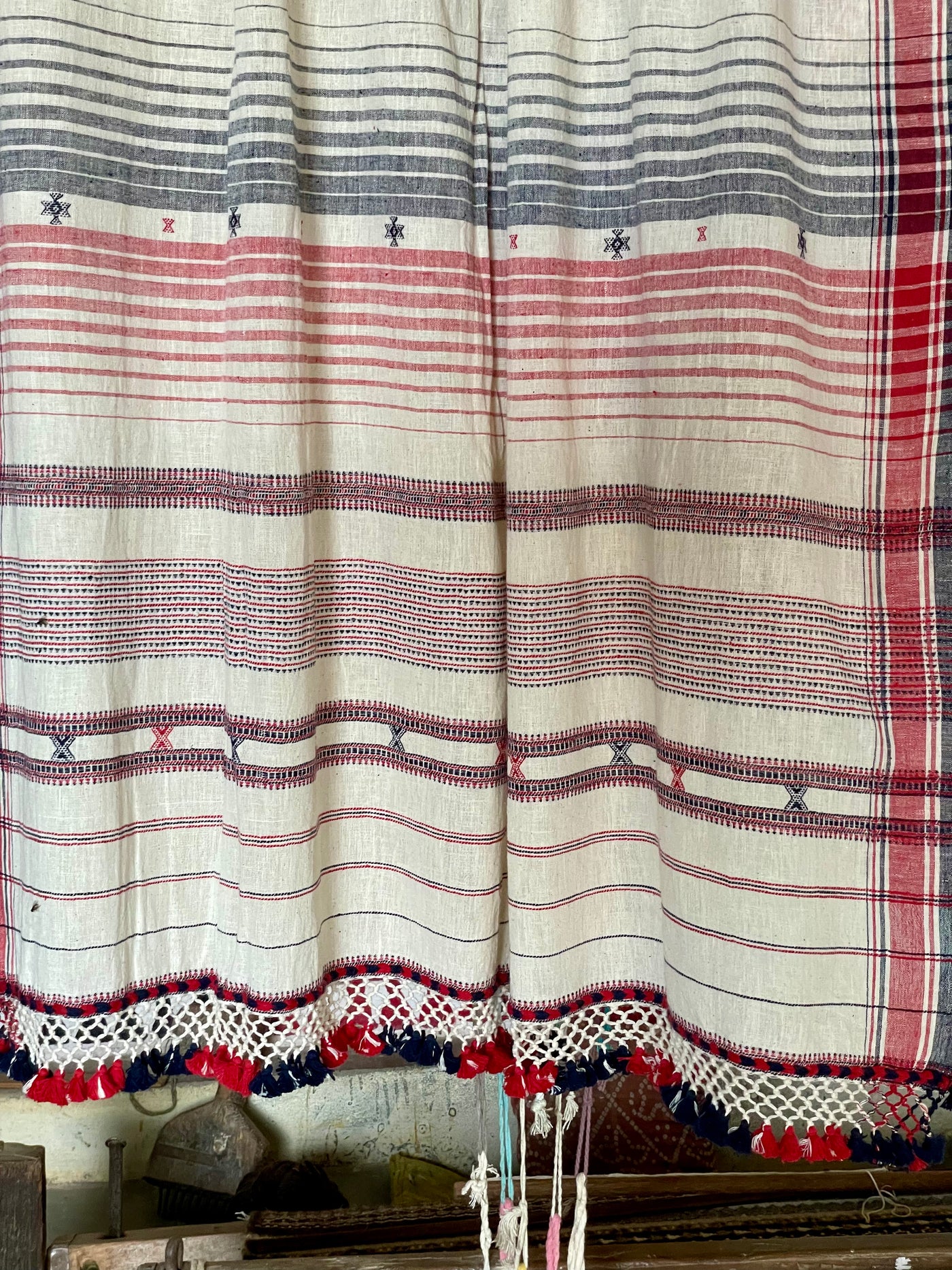 Elegant cloud Bhujodi saree woven in sustainable Kala Cotton with intricate artisan detailing