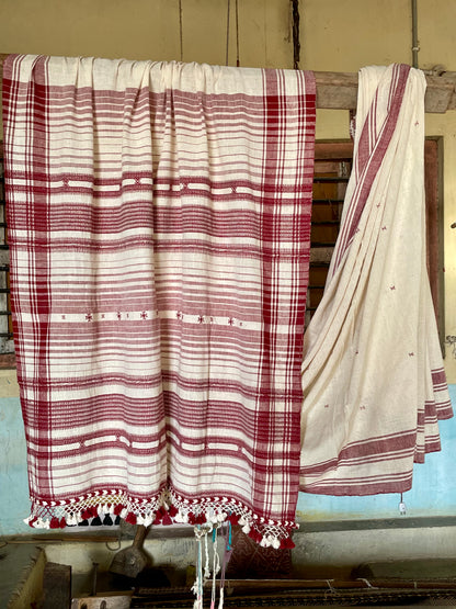 Handcrafted cream Kala Cotton saree adorned with authentic Bhujodi weaving and heritage-inspired motifs