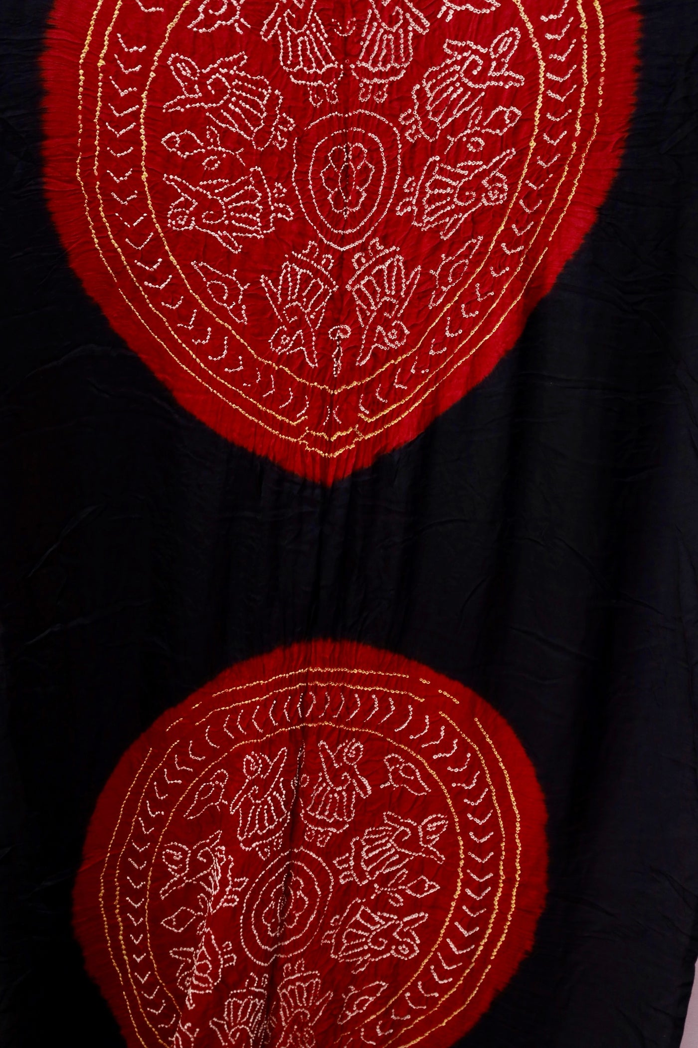 Traditional Bandhani Gajji silk saree in crimson red tones with a beautifully woven zari pallu