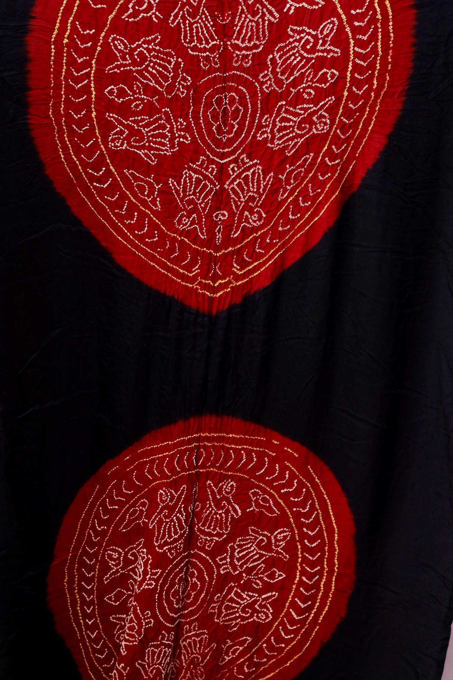 Traditional Bandhani Gajji silk saree in crimson red tones with a beautifully woven zari pallu