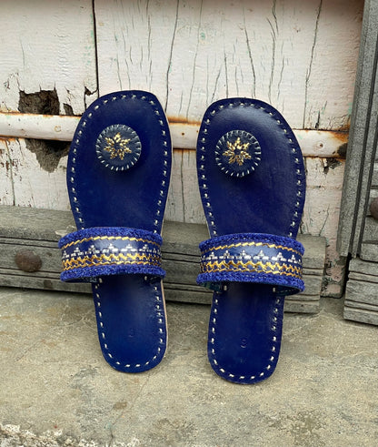 Premium dark blue handcrafted leather flats with fine artisan stitching details