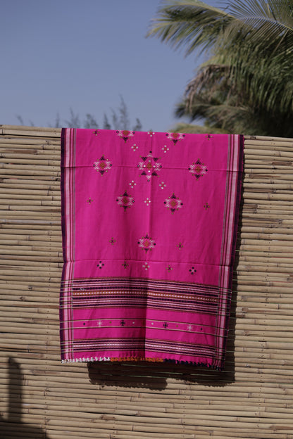 Traditional fuchsia pink wool shawl showcasing authentic weaving artistry and timeless elegance