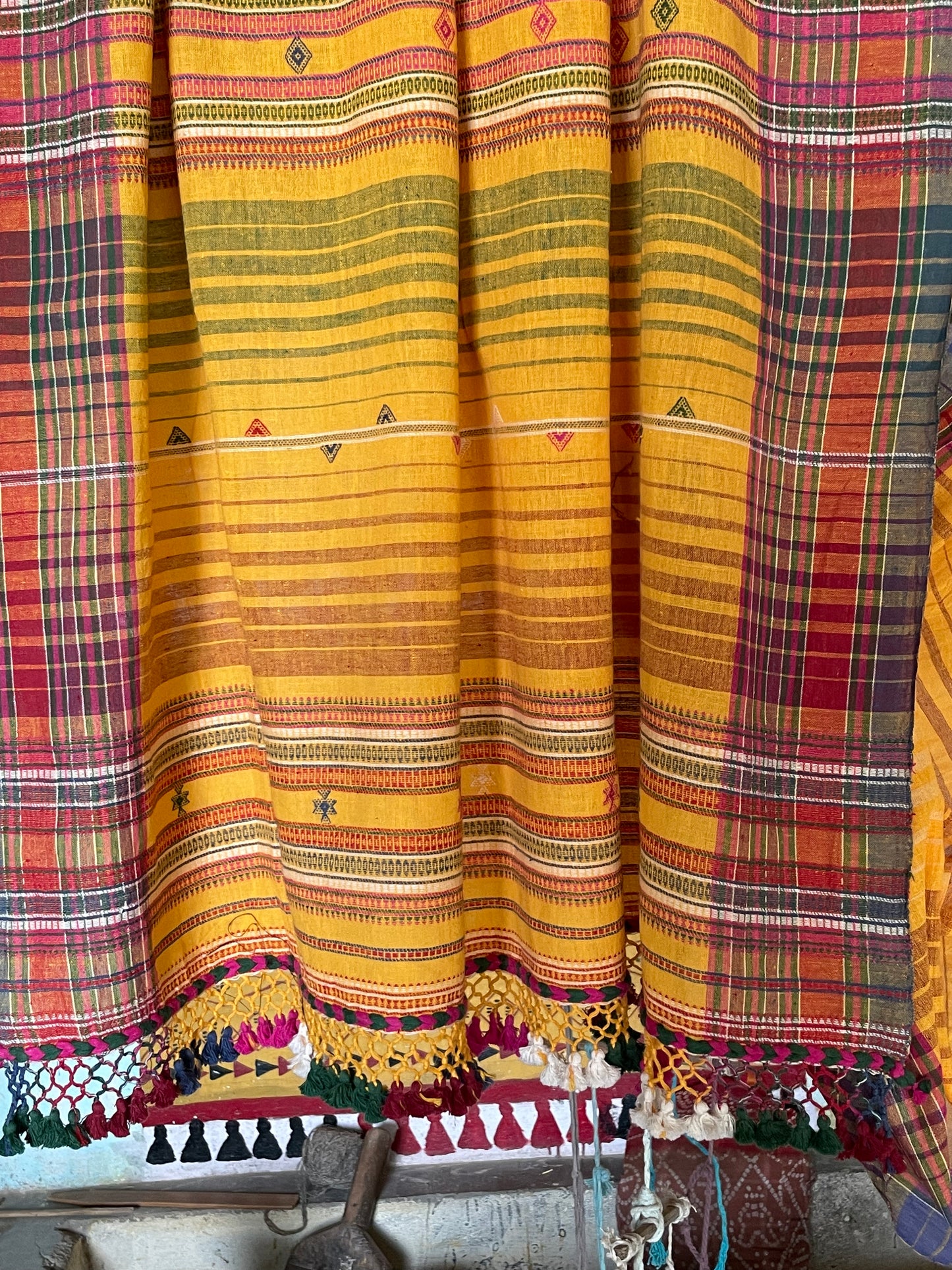 Premium golden Kala Cotton saree showcasing traditional Bhujodi textile artistry and timeless appeal