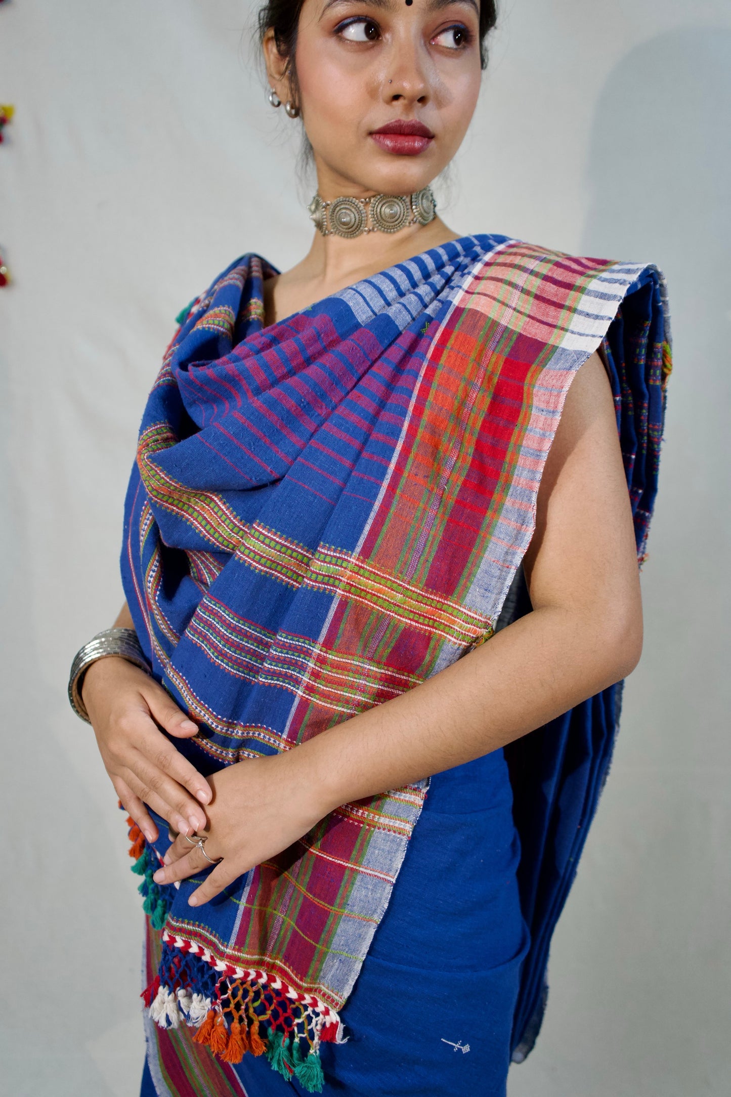 Elegant indigo Bhujodi saree woven in sustainable Kala Cotton with intricate artisan detailing