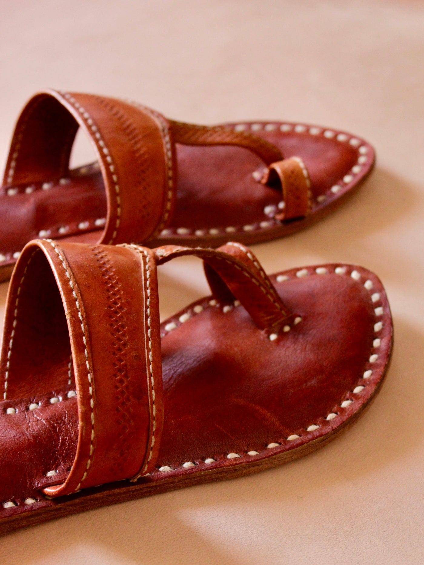 remium Kolhapuri leather flats handcrafted with fine stitching details