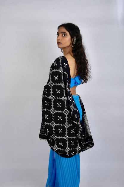Traditional midnight black wool shawl showcasing intricate handloom weaving and refined finish