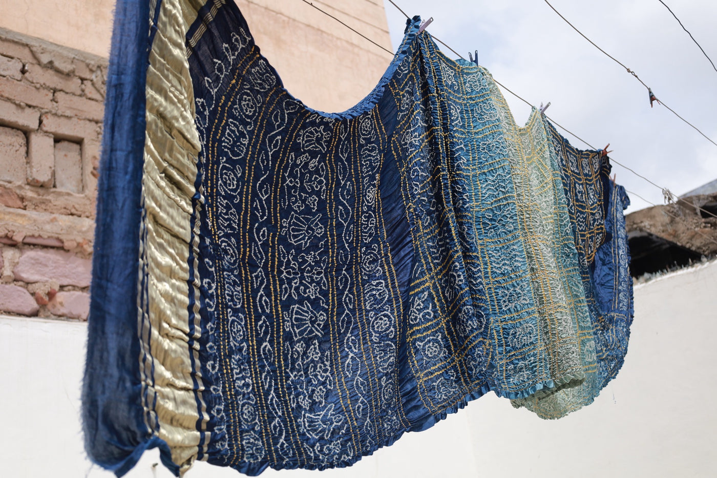 Handcrafted midnight blue silk saree showcasing authentic Rai Bandhani artistry with rich zari detailing