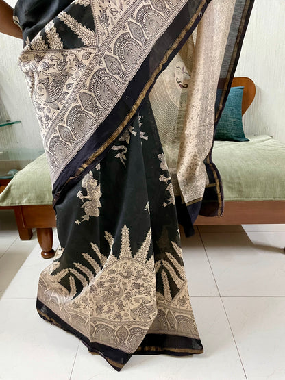 Elegant midnight and grey saree showcasing detailed Mata Ni Pachedi artwork created by skilled artisans