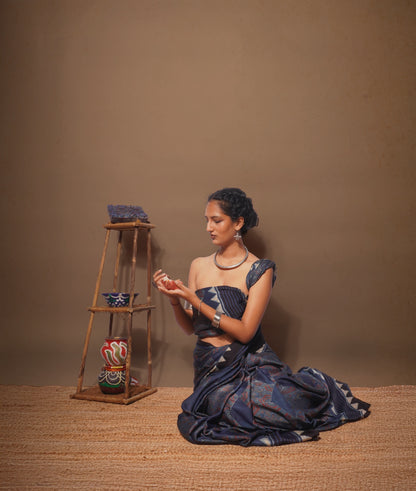 Handcrafted midnight navy modal silk saree adorned with traditional Ajrakh patterns and artisanal detailing