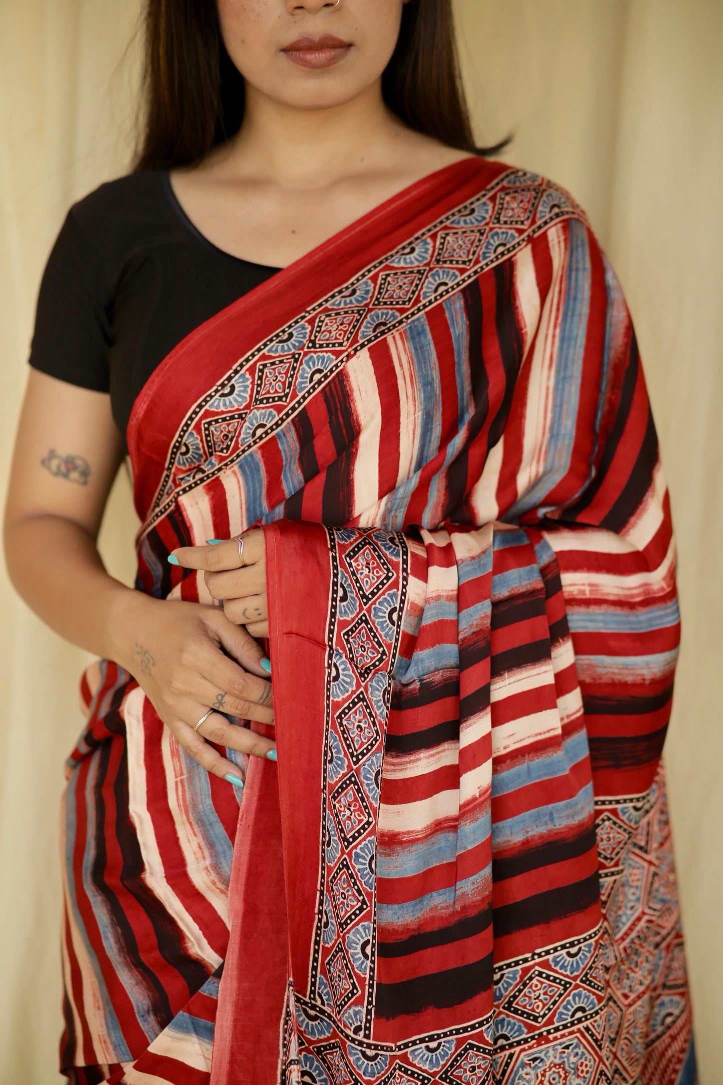 Elegant multicolor stripe Ajrakh saree in modal silk showcasing skilled artisan block printing techniques