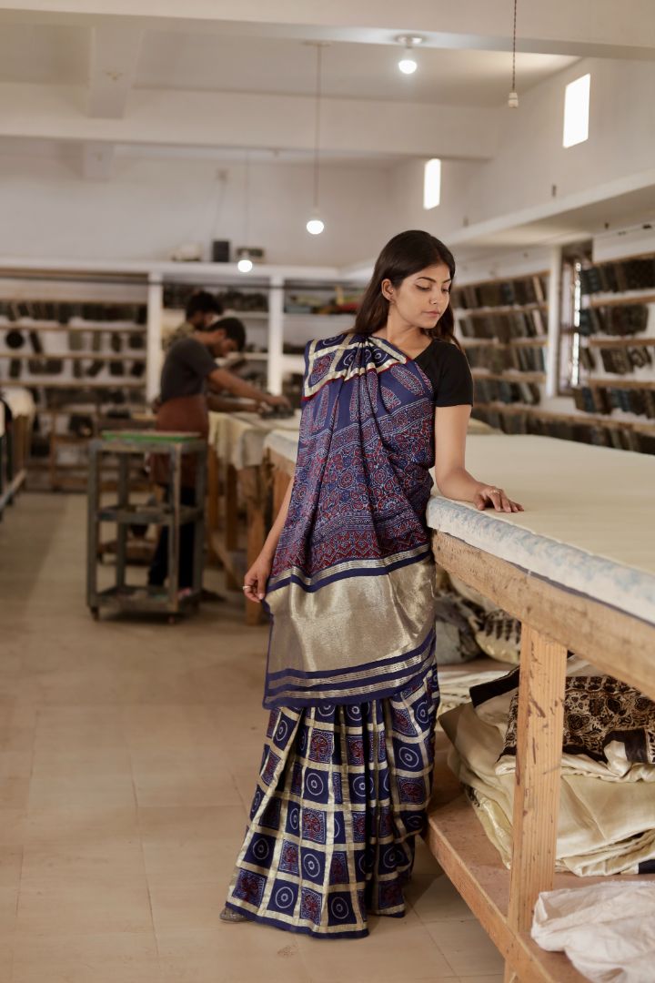 Elegant navy blue Gharchola Ajrakh saree crafted in luxurious modal silk with traditional artisanal designs