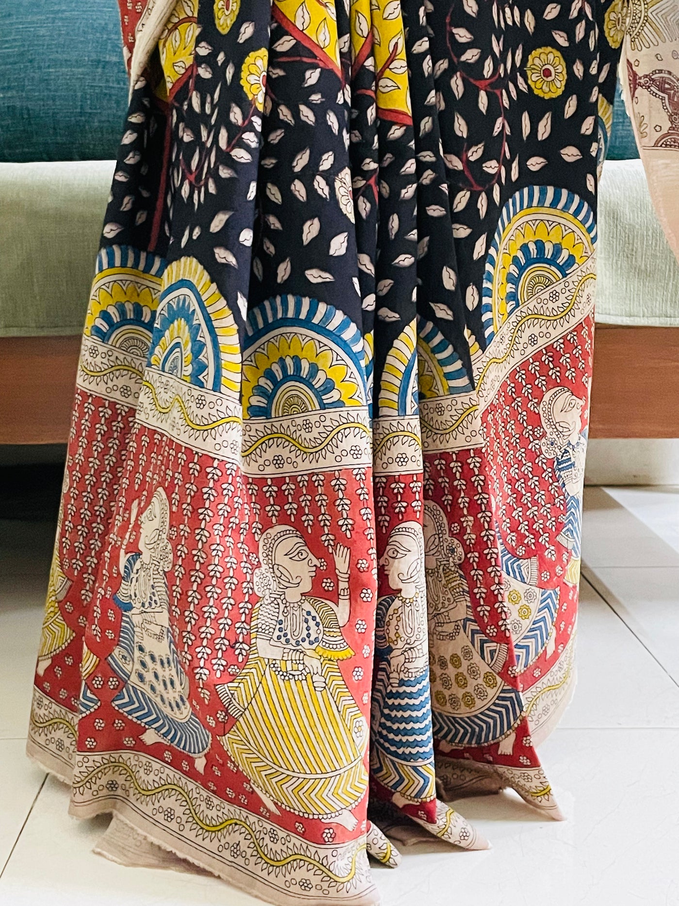 Elegant ocean saree showcasing detailed Mata Ni Pachedi artwork created by skilled artisans