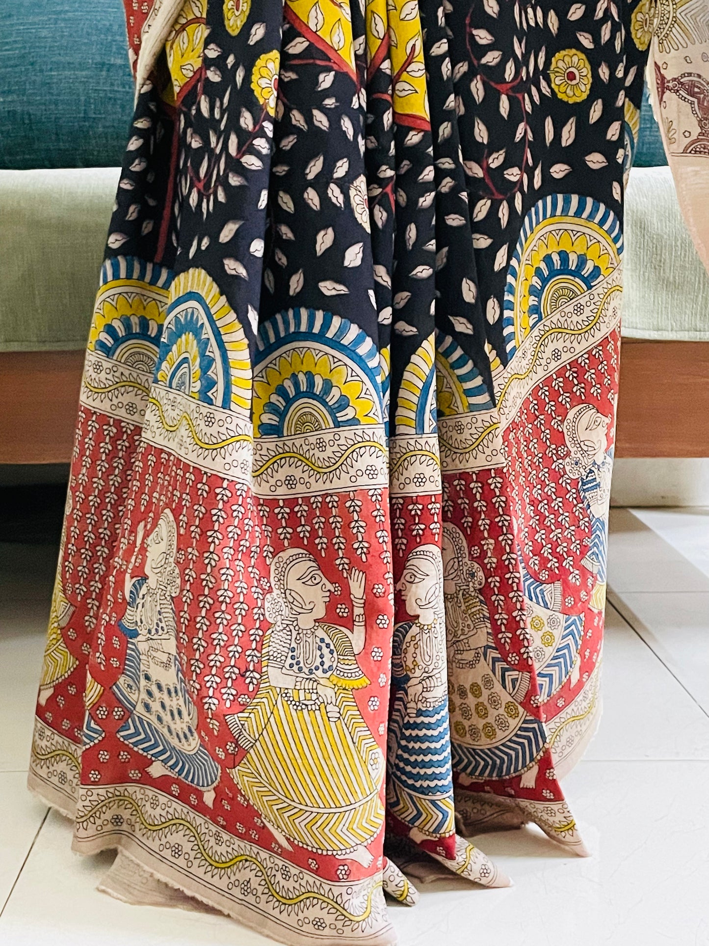 Elegant ocean saree showcasing detailed Mata Ni Pachedi artwork created by skilled artisans