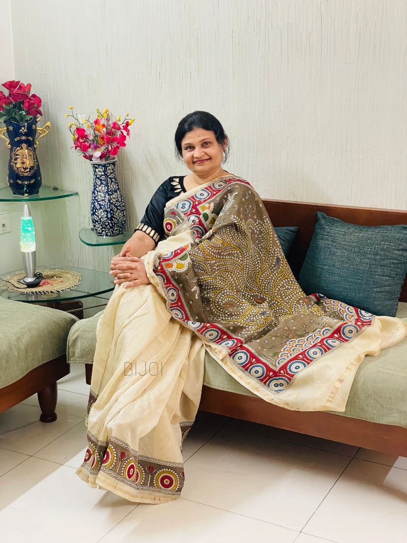 Elegant olive branch saree showcasing detailed Mata Ni Pachedi artwork created by skilled artisans